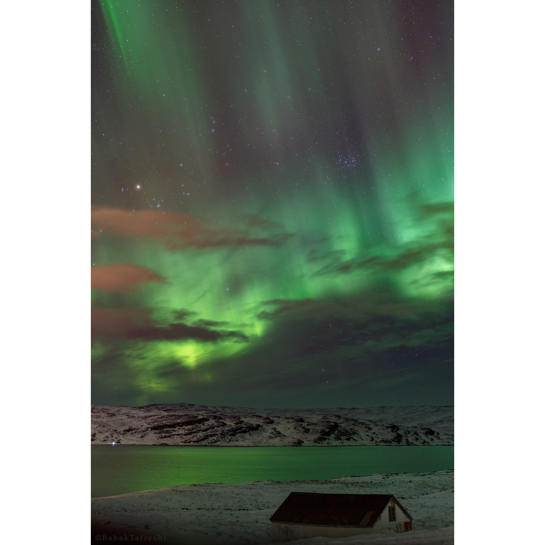 Green Aurora Rays | Babak Tafreshi Photography